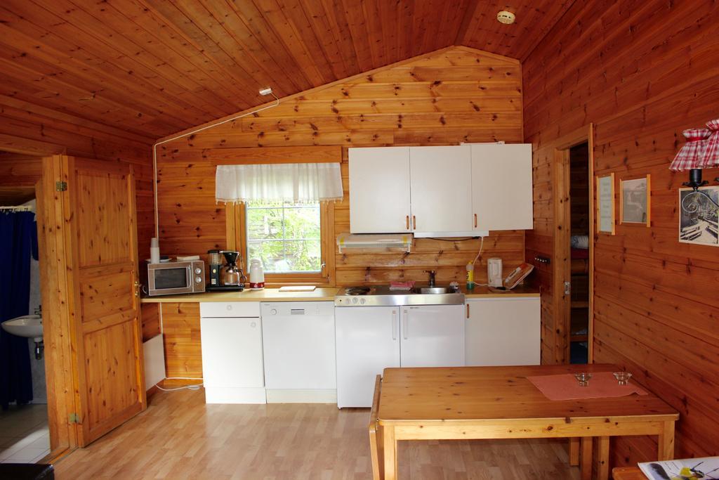 Skysstasjonen Cottages Рёльдаль Номер фото